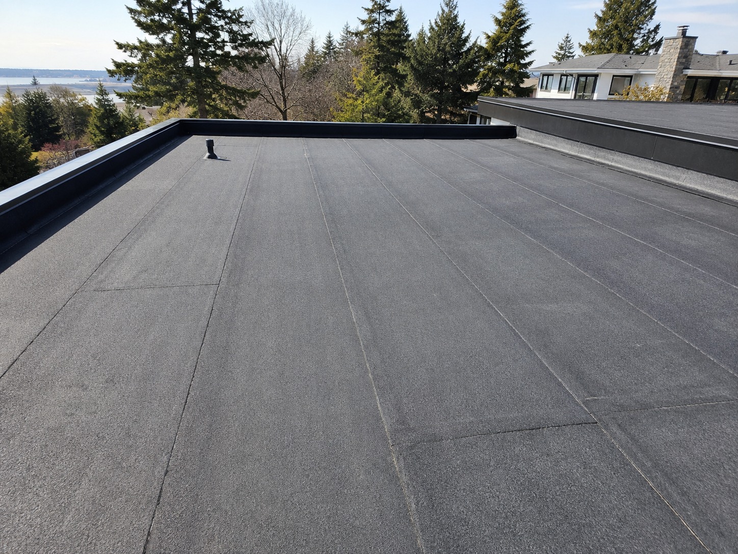 Torch-on membrane roofing on a low-pitched roof